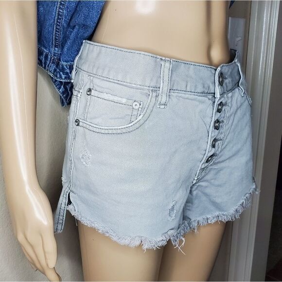 Free People Rugged Ripped Denim Shark Bite Shorts - Picture 12 of 13